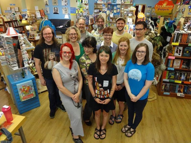 Staff at Rediscovered Books welcome customers during the store's 10th anniversary celebration.