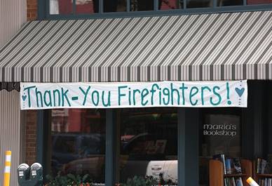 Maria's storefront with firefighters sign