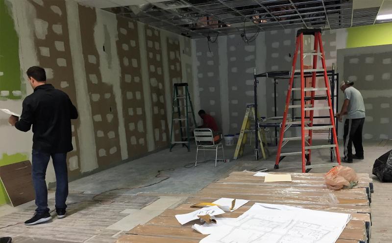 Whitelam Books’ interior is under construction in a space that formerly sold frozen yogurt.