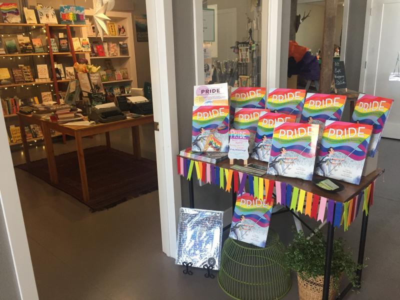 "Pride" by Rob Sanders on display in front of Tombolo Books' pop-up store.