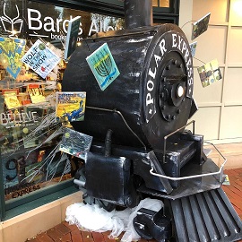 A window display at Bards Alley that features the Polar Express.