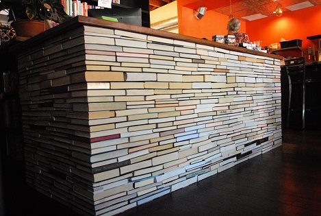 A desk made out of recycled books at BookBar in Denver