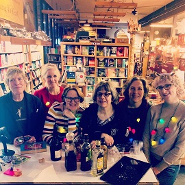 Booksellers celebrating the holidays at Island Books in Mercer Island, Washington.
