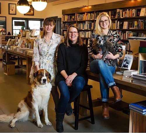 Staff and dogs at Jackson Hole Book Trader