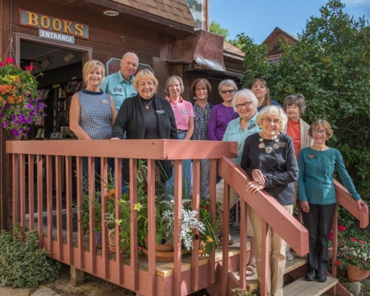 The Macdonald family and team poses together to celebrate the 90th anniversary of MacDonald Bookshop. 
