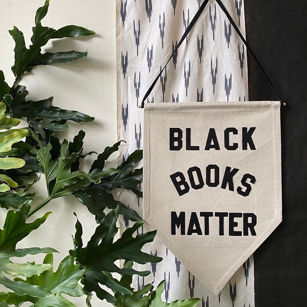 MahoganyBooks sign that reads "Black Books Matter"