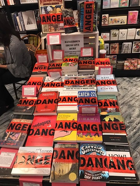 Books wrapped in “danger” tape at Midtown Reader.