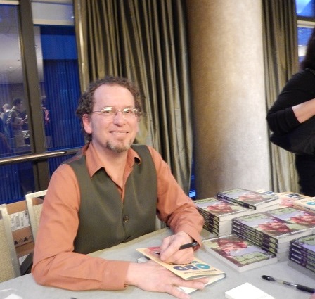 Author Patrick Jennings signs at the closing Small & Independent Press Author Reception.