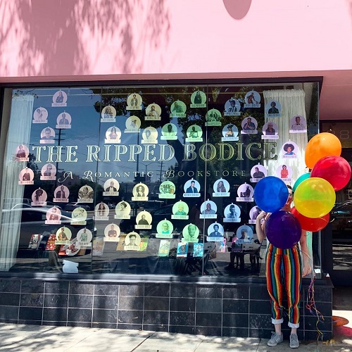 A Pride-themed window display at the Ripped Bodice