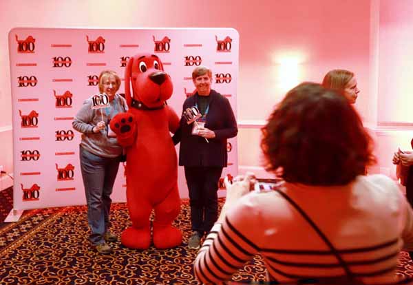 Clifford the Big Red Dog meets with booksellers during the celebration of 100 years of reading with Scholastic.