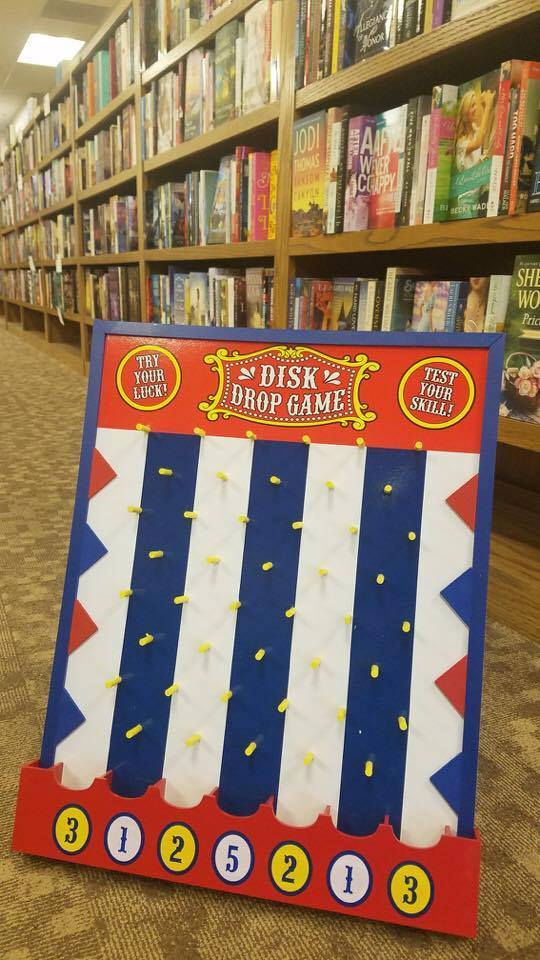 Customers played Plinko to win prizes at Another Chapter's Independent Bookstore Day celebration.