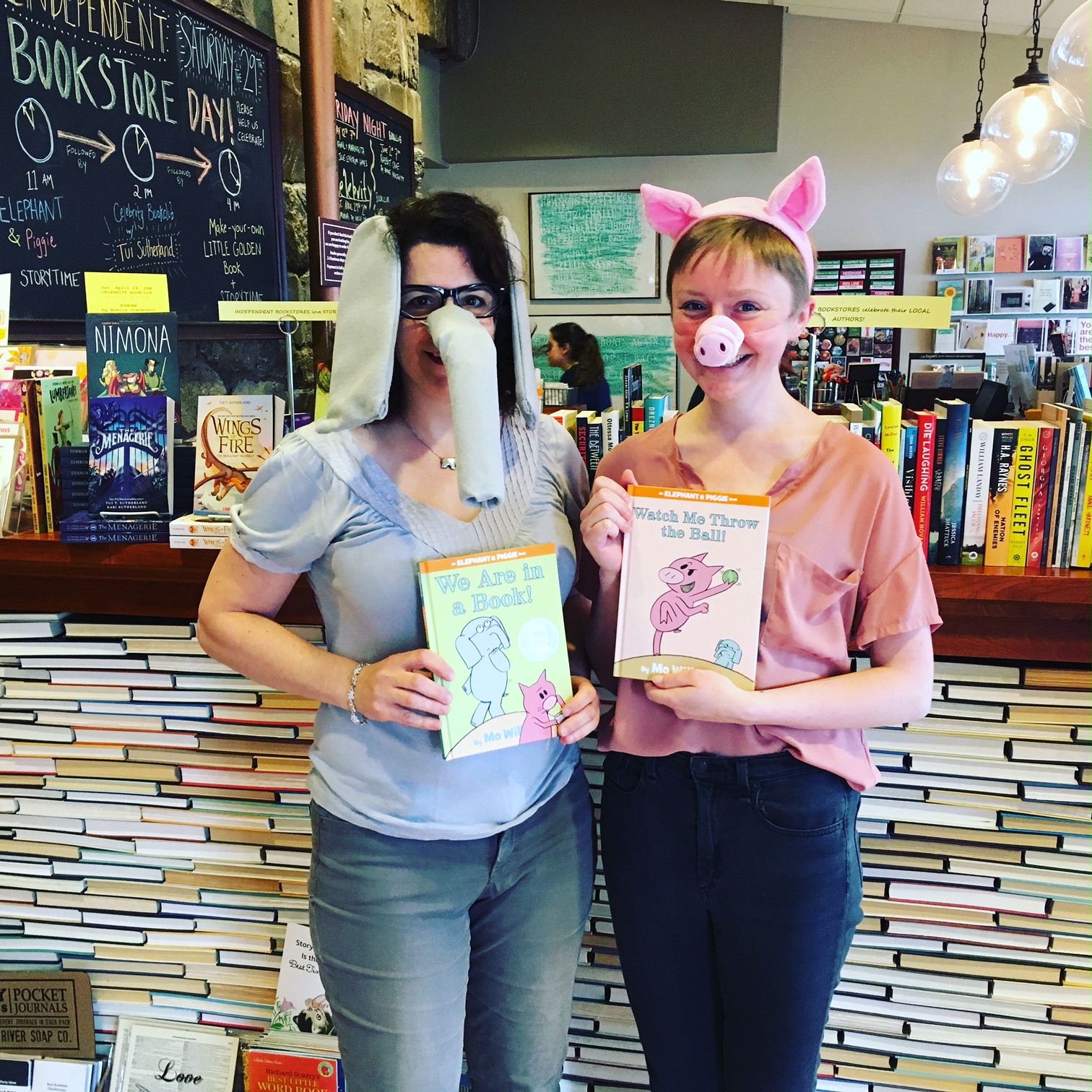 Booksellers dressed as the titular characters for an Elephant & Piggie story time.