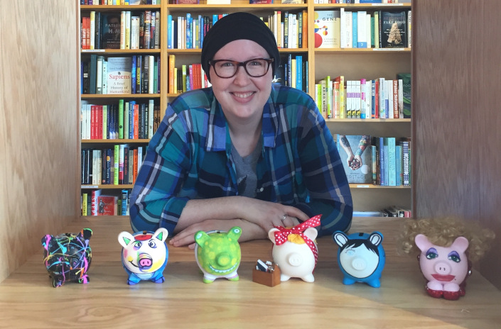 Stephanie Appell with piggy banks